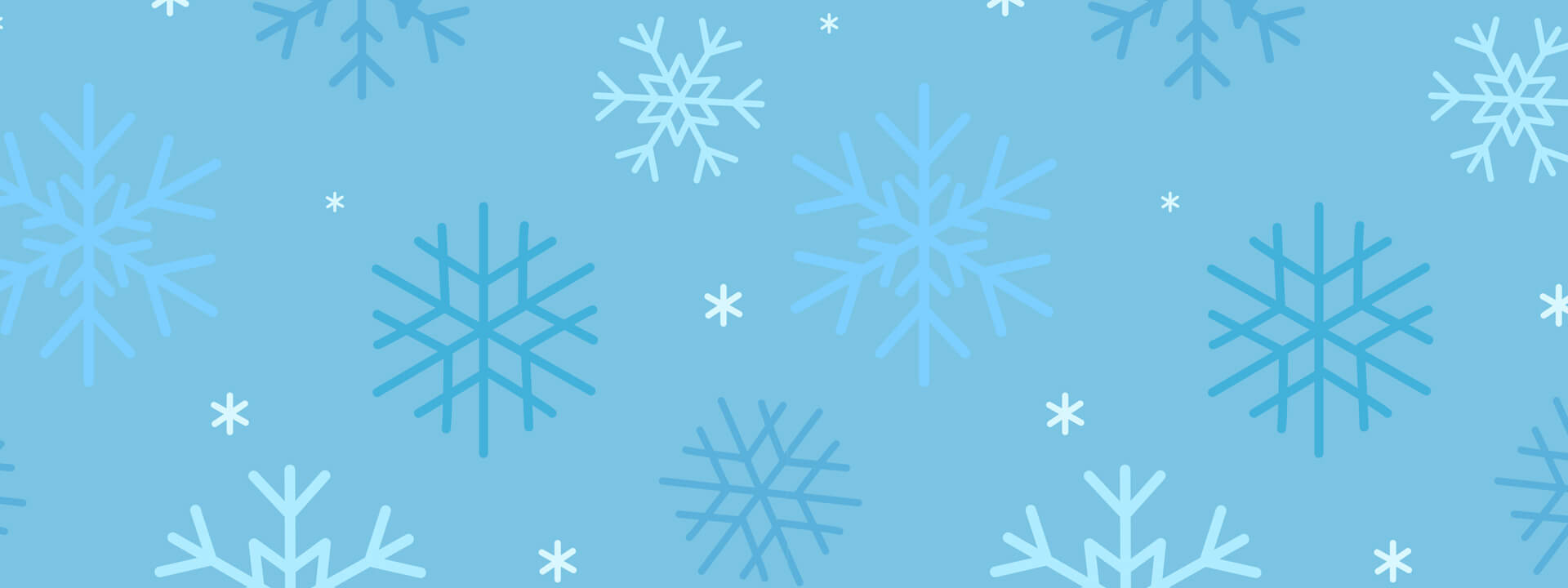 Grafische Schneeflocken vor blauem Hintergrund.