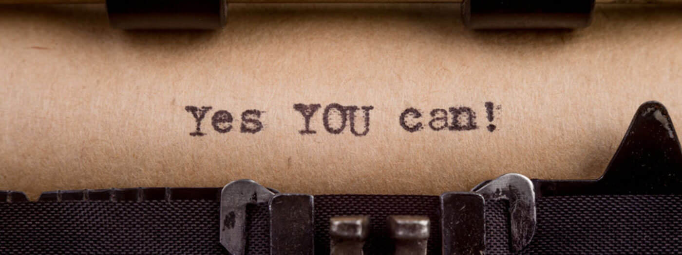 Alte Schreibmaschine mit der Anzeige Yes You can.